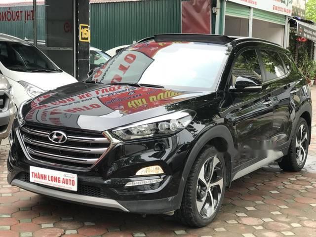 Hyundai Tucson 1.6 Turbo  2016 - Bán Hyundai Tucson 1.6 Turbo năm 2016, màu đen, giá 940tr