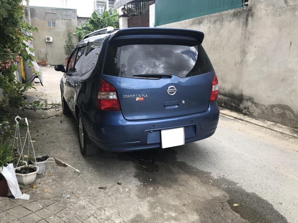 Nissan Livina 1.8MT 2010 - Đổi xe mới cần bán xe Livina 2010, số tự động, màu xanh, bản 1.8