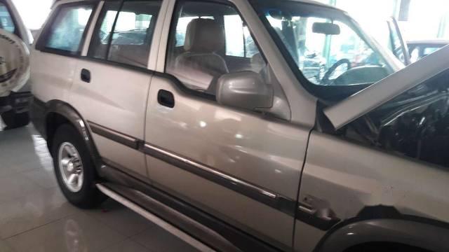 Ssangyong Musso 2004 - Cần bán xe Ssangyong Musso sản xuất 2004, màu ghi vàng 