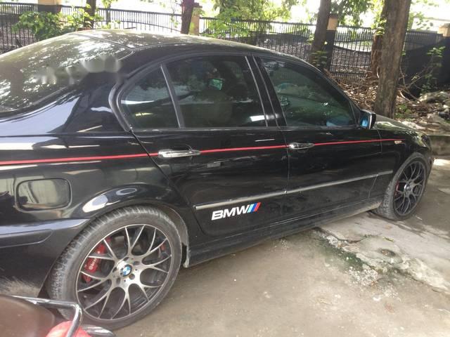 BMW 3 Series   2004 - Cần bán xe BMW 3 Series 2004, màu đen, xe gia đình