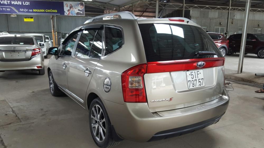 Kia Carens S 2.0MT 2015 - Bán Kia Carens S 2.0MT, màu vàng cát, sản xuất 2015 biển Sài Gòn đi 67000km