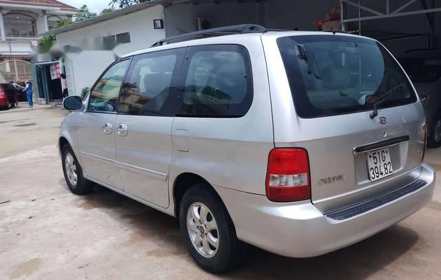 Kia Carnival   2006 - Gia đình bán Kia Carnival năm 2006, màu bạc