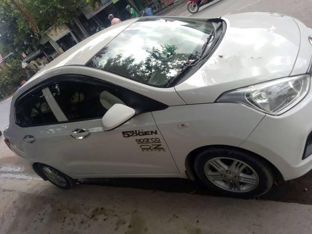 Hyundai Grand i10 2016 - Gia đình bán Hyundai Grand i10 2016, màu trắng 