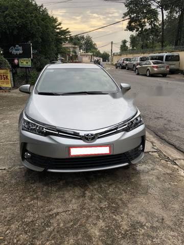 Toyota Corolla altis 1.8G 2017 - Cần bán Toyota Corolla altis 1.8G đời 2017, màu bạc như mới