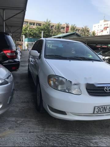 Toyota Corolla LE  2005 - Cần bán Toyota Corolla LE 2005, màu trắng, nhập khẩu nguyên chiếc số tự động