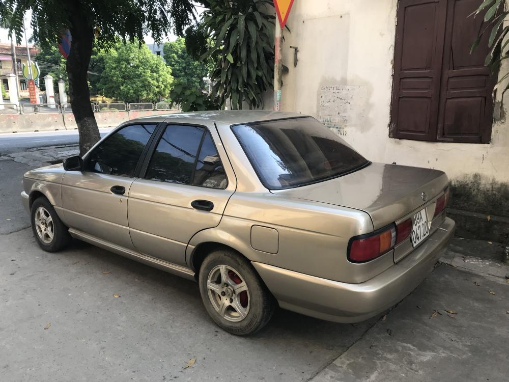 Nissan Sunny 1993 - Bán xe Nissan Sunny năm 1993, màu kem, giá chỉ 58 triệu nhập khẩu nguyên chiếc