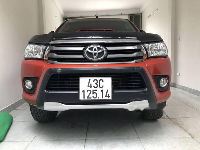 Toyota Hilux   2016 - Cần bán Toyota Hilux đời 2016, màu đỏ xe gia đình, giá 605tr