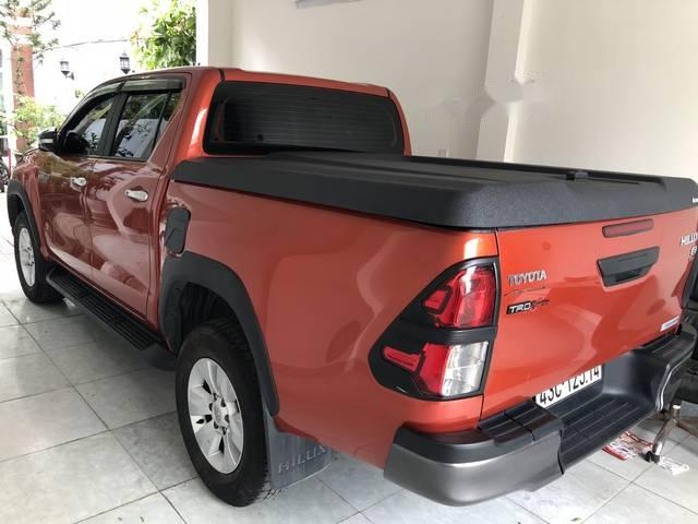 Toyota Hilux   2016 - Cần bán Toyota Hilux đời 2016, màu đỏ xe gia đình, giá 605tr