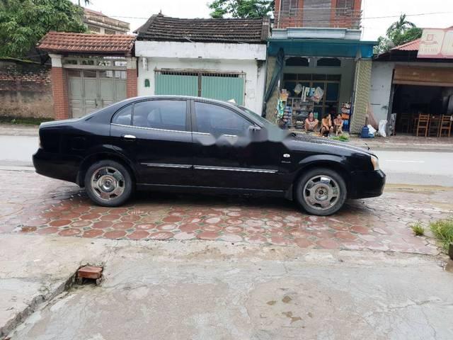 Daewoo Magnus 2005 - Cần bán gấp Daewoo Magnus năm sản xuất 2005, màu đen 