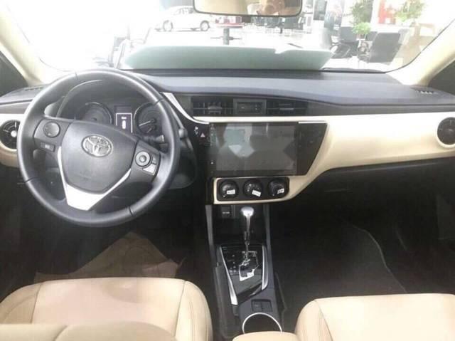 Toyota Corolla altis  E MT 2018 - Cần bán Toyota Corolla Altis E MT sản xuất 2018, màu trắng, giá tốt
