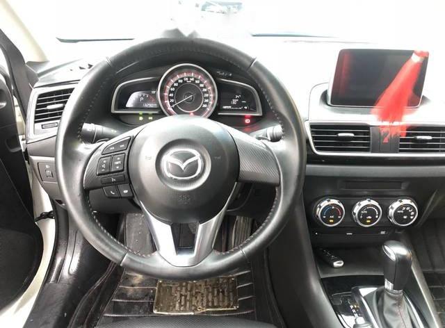 Mazda 3 1.5AT 2015 - Cần bán lại xe Mazda 3 1.5AT 2015, màu trắng chính chủ, giá chỉ 595 triệu