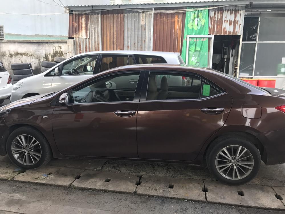 Toyota Corolla altis 2015 - Bán ô tô Toyota Corolla altis sản xuất 2015, màu nâu