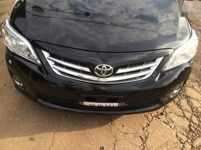 Toyota Corolla altis  MT 2009 - Bán Toyota Corolla Altis MT đời 2009, màu đen,. Máy móc nội thất rin đét