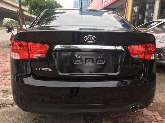 Kia Forte 2010 - Bán ô tô Kia Forte sản xuất 2010, màu đen chính chủ  