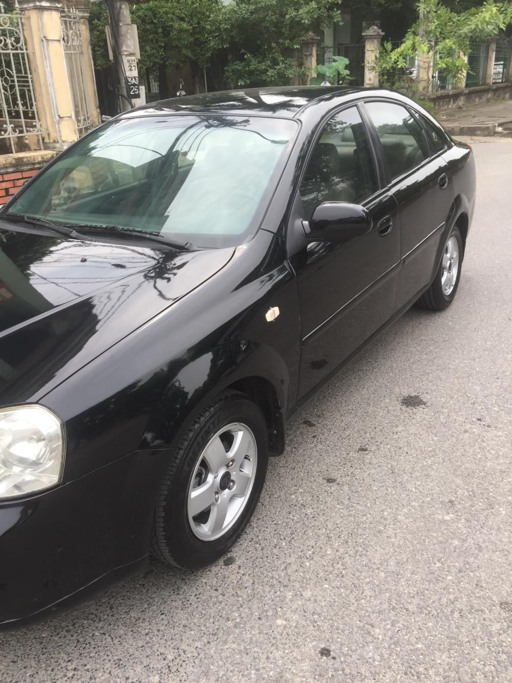 Daewoo Lacetti 2004 - Cần bán xe Daewoo Lacetti đời 2004, màu đen chính chủ, giá 145tr