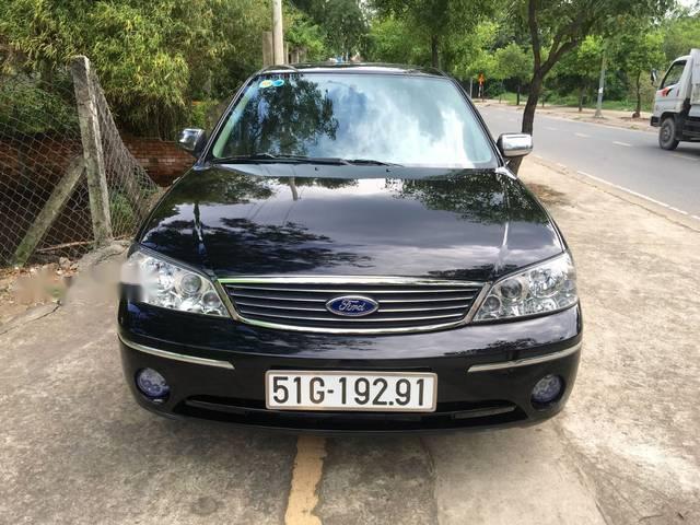 Ford Laser 2004 - Bán Ford Laser sản xuất năm 2004, màu đen 