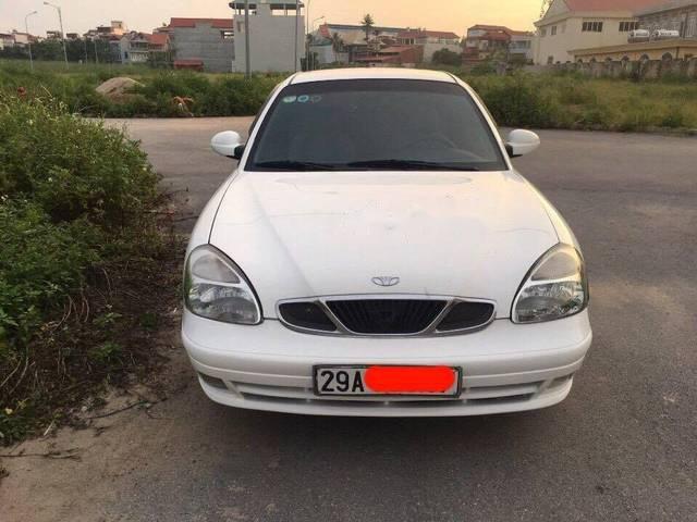 Daewoo Nubira    II  2004 - Bán lại chiếc xe Daewoo Nubira II màu trắng Đk 2004, tư nhân chính chủ