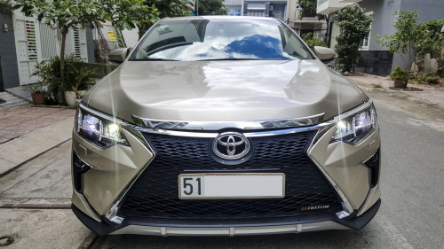 Toyota Camry   AT  2016 - Cần bán Toyota Camry AT sản xuất năm 2016, màu vàng  