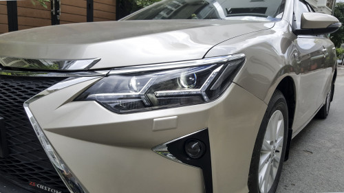 Toyota Camry   AT  2016 - Cần bán Toyota Camry AT sản xuất năm 2016, màu vàng  