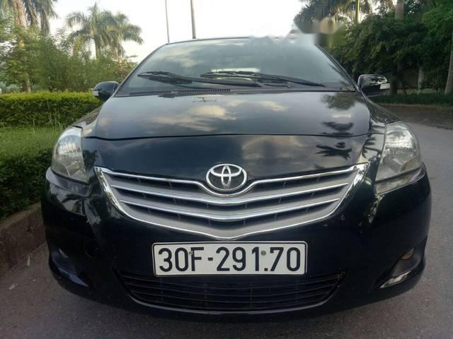 Toyota Vios   2011 - Bán xe Toyota Vios năm 2011, màu đen số sàn