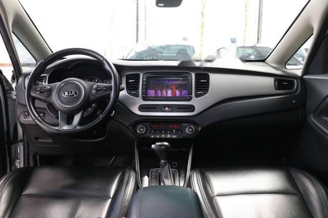 Kia Rondo 2.0AT   2015 - Bán ô tô Kia Rondo 2.0AT đời 2015, màu bạc, giá 566tr