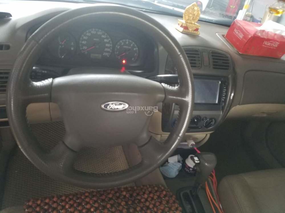 Ford Laser 2004 - Cần bán Ford Laser năm 2004, số tự động, màu đen, xe nhập