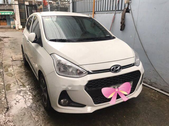 Hyundai Grand i10  1.0 AT  2017 - Bán xe Hyundai Grand i10 1.0 AT đời 2017, màu trắng chính chủ, 395 triệu 