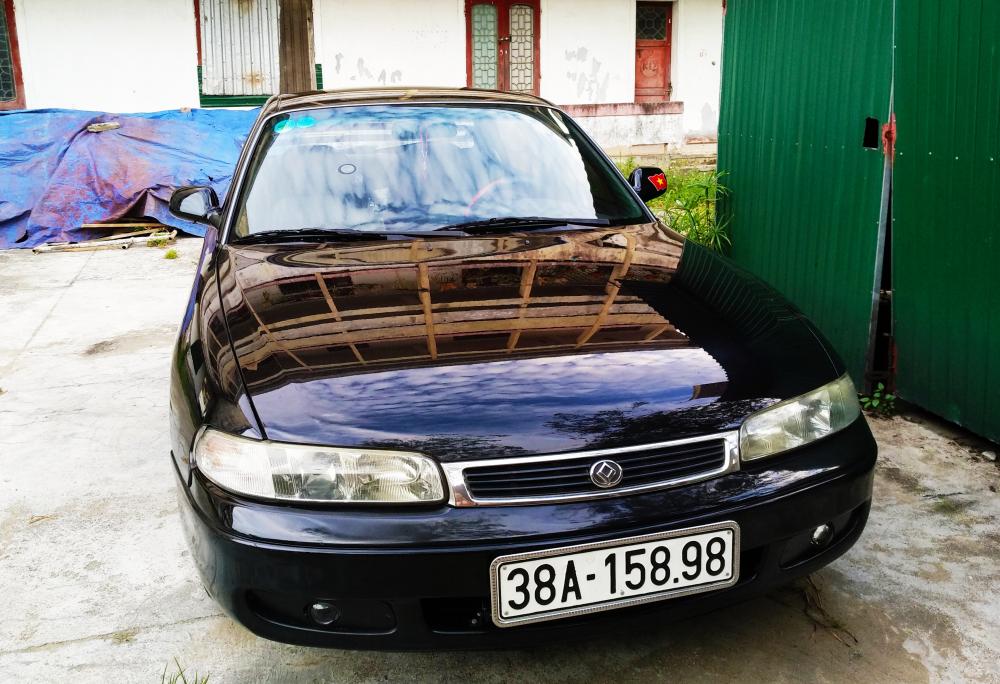 Mazda 626 1996 - Bán xe Mazda 626 đời 1996, màu đen, nhập khẩu, giá tốt 150 triệu