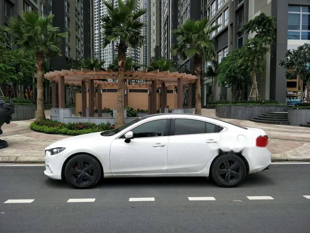 Mazda 6  2.0 2015 - Cần bán lại xe Mazda 6 2.0 sản xuất năm 2015, màu trắng, giá tốt