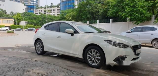 Mazda 3 2016 - Cần bán xe Mazda 3 2016, màu trắng, 640 triệu