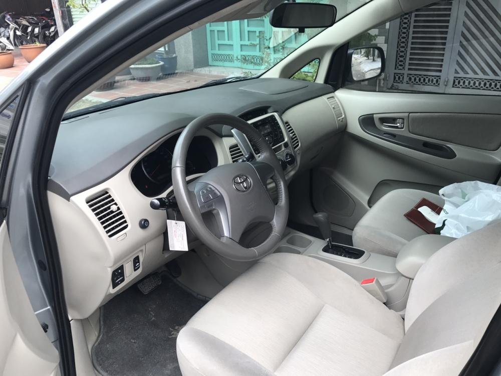 Toyota Innova G 2014 - Mình bán Toyota Innova G 2014 số tự động, màu bạc, xe đẹp, zin nguyên