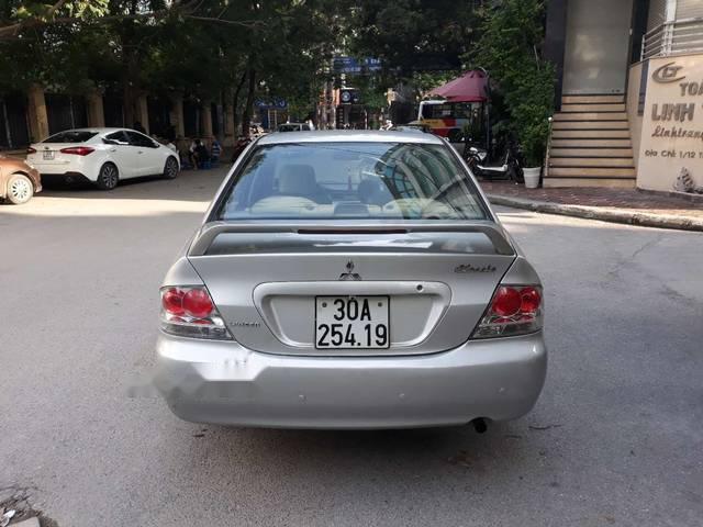 Mitsubishi Lancer 2004 - Bán Mitsubishi Lancer sản xuất 2004, màu bạc
