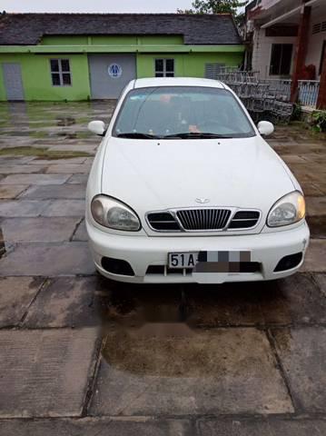 Daewoo Lanos   2003 - Cần bán Daewoo Lanos đời 2003, màu trắng xe gia đình, giá chỉ 98 triệu