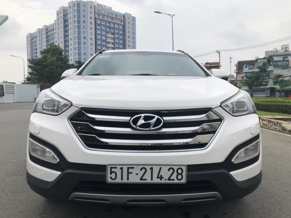 Hyundai Santa Fe SE 3.3 AT AWD 2016 - Bán Santa Fe 2016 CDI máy dầu số tự động 100km 8 lít. Màu trắng, hàng full đủ đồ