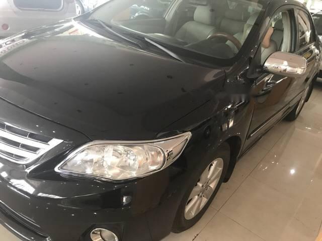 Toyota Corolla altis 2009 - Cần bán gấp Toyota Corolla altis đời 2009, màu đen như mới