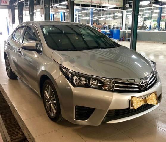 Toyota Corolla altis 1.8G MT 2016 - Cần bán Toyota Corolla altis 1.8G MT 2016, màu bạc số sàn, giá 665tr