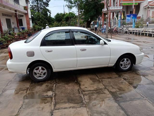 Daewoo Lanos   2003 - Cần bán Daewoo Lanos đời 2003, màu trắng xe gia đình, giá chỉ 98 triệu