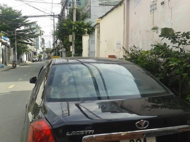 Daewoo Lacetti 2004 - Bán ô tô Daewoo Lacetti sản xuất 2004, màu đen số sàn