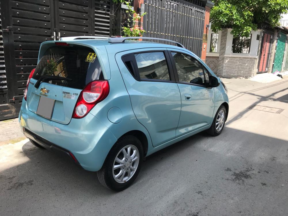 Chevrolet Spark 2015 - Bán Chevrolet Spark LTZ 2015, màu xanh ngọc, số tự động, xe zin rất đẹp