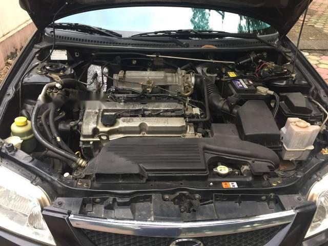 Mazda 323 2004 - Cần bán xe Mazda 323 2004, màu đen xe gia đình, 190tr