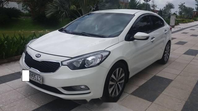 Kia K3   1.6 MT  2015 - Bán Kia K3 1.6 MT đời 2015, màu trắng, giá chỉ 485 triệu