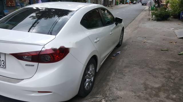 Mazda 3 1.5 AT 2016 - Cần bán lại xe Mazda 3 1.5 AT đời 2016, màu trắng còn mới 