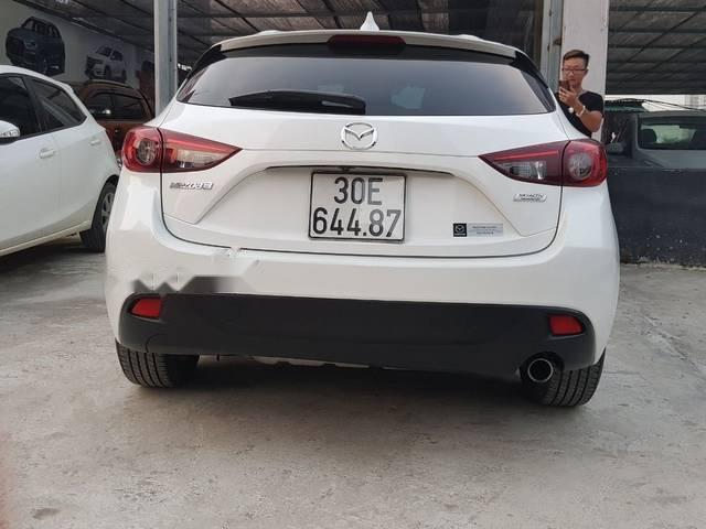 Mazda 3 2016 - Cần bán lại xe Mazda 3 sản xuất năm 2016, màu trắng, 635tr