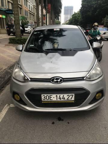 Hyundai Grand i10 1.25 2015 - Cần bán lại xe Hyundai Grand i10 1.25 đời 2015, màu bạc, xe nhập chính chủ 