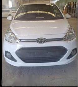 Hyundai Grand i10 2016 - Cần bán xe Hyundai Grand i10 năm 2016, màu trắng, nhập khẩu như mới