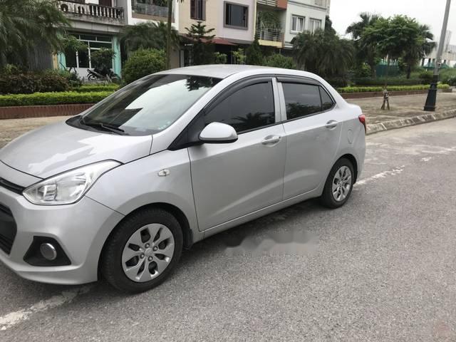 Hyundai Grand i10 1.25 2015 - Bán ô tô Hyundai Grand i10 1.25 đời 2015, màu bạc, nhập khẩu nguyên chiếc, giá 328tr