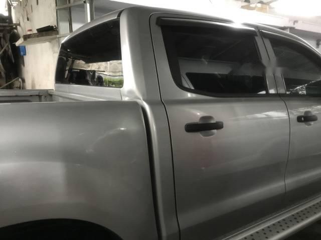 Ford Ranger   XL  MT 2014 - Bán Ford Ranger 2.2 XL 4x4 MT 2014, màu bạc, 2 cầu, còn mới 95%