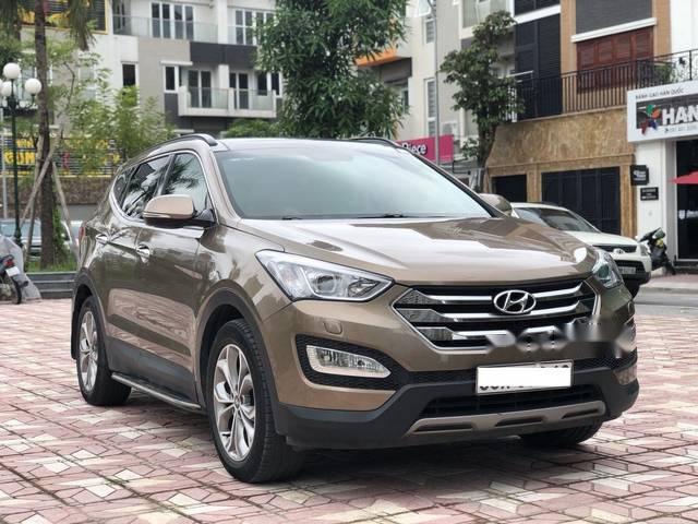 Hyundai Santa Fe 2016 - Cần bán lại xe Hyundai Santa Fe sản xuất năm 2016, màu nâu như mới