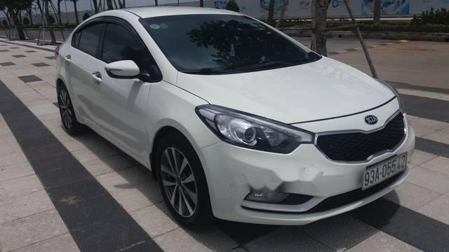 Kia K3   1.6 MT  2015 - Bán Kia K3 1.6 MT đời 2015, màu trắng, giá chỉ 485 triệu