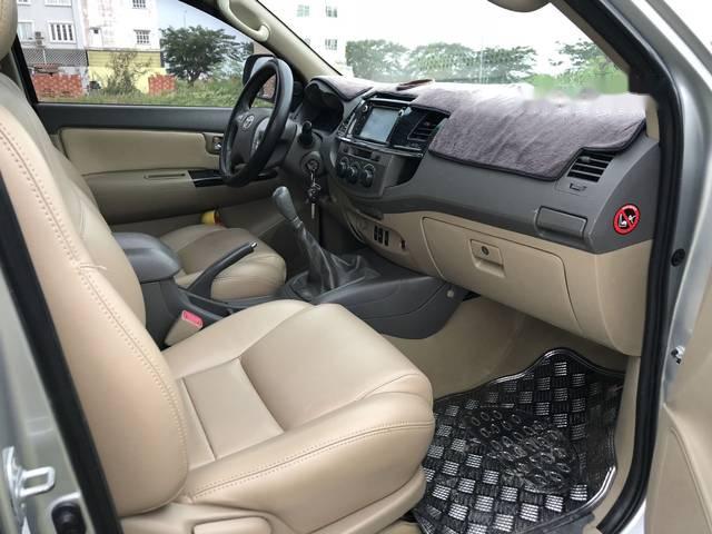 Toyota Fortuner G 2014 - Bán ô tô Toyota Fortuner G sản xuất 2014, màu bạc đã đi 68.000km, giá 815tr